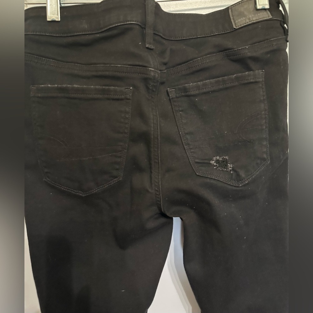 AMERICAN EAGLE WOMENS DREAM STRETCH JEGGING DESTROYED BLACK 10L/30W - Picture 5 of 9